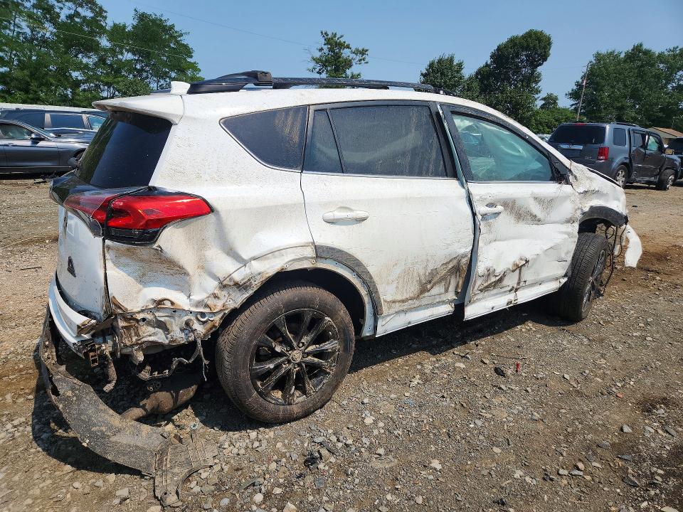 Photo 3 from auction – 2018 TOYOTA RAV4 with VIN 2T3RFREV0JW808716