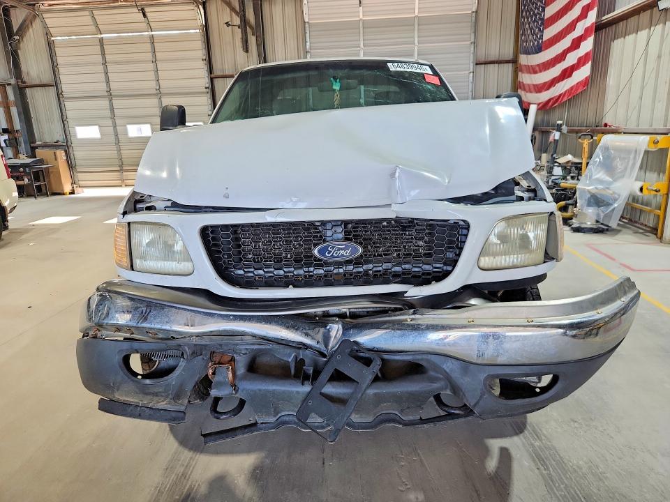 Photo 5 from auction – 2002 FORD F150 with VIN 1FTRX18L72NA83360