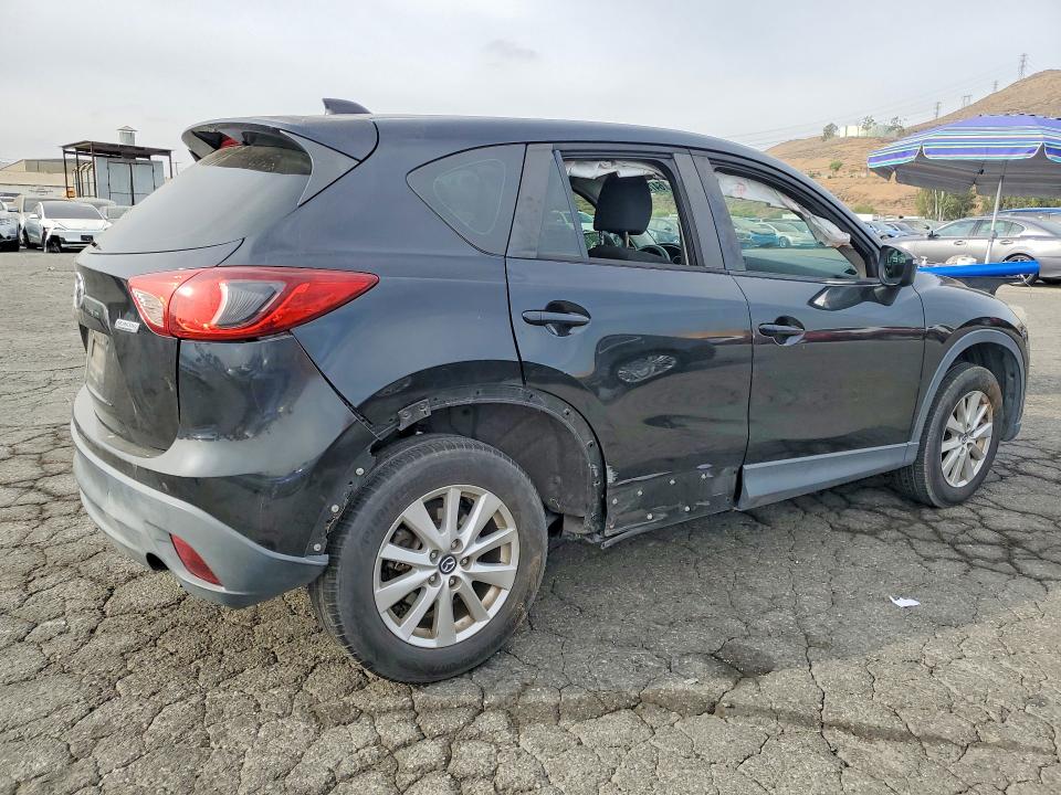Photo 3 from auction – 2015 MAZDA CX-5 with VIN JM3KE2BE2F0494697