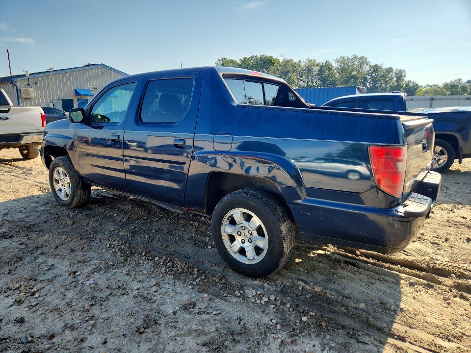 Photo 2 from auction – 2010 HONDA RIDGELINE with VIN 5FPYK1F59AB002457