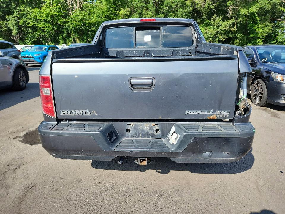 Photo 6 from auction – 2010 HONDA RIDGELINE with VIN 5FPYK1F42AB001061