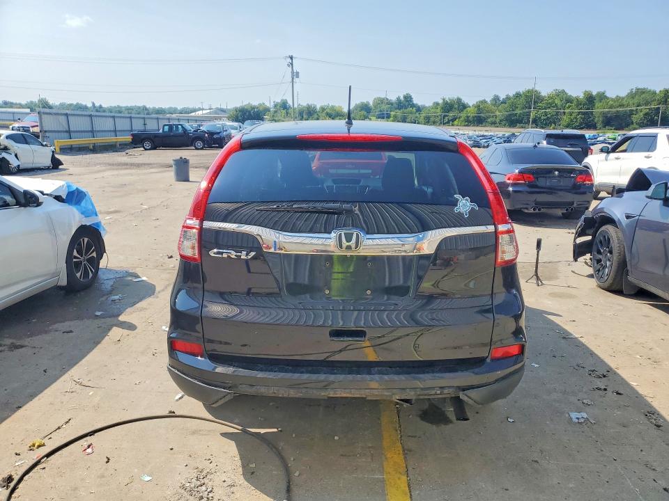 Photo 6 from auction – 2015 HONDA CR-V with VIN 3CZRM3H59FG705634