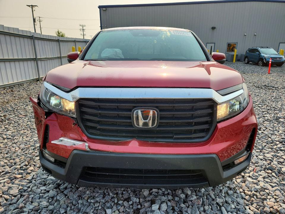 Photo 5 from auction – 2023 HONDA RIDGELINE with VIN 5FPYK3F54PB037167