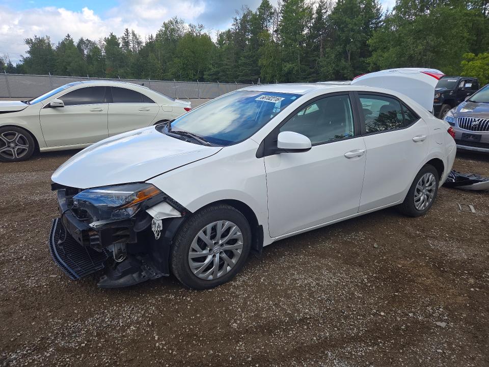 TOYOTA COROLLA 2018 with VIN 2T1BURHE0JC083194 - Photo from auction