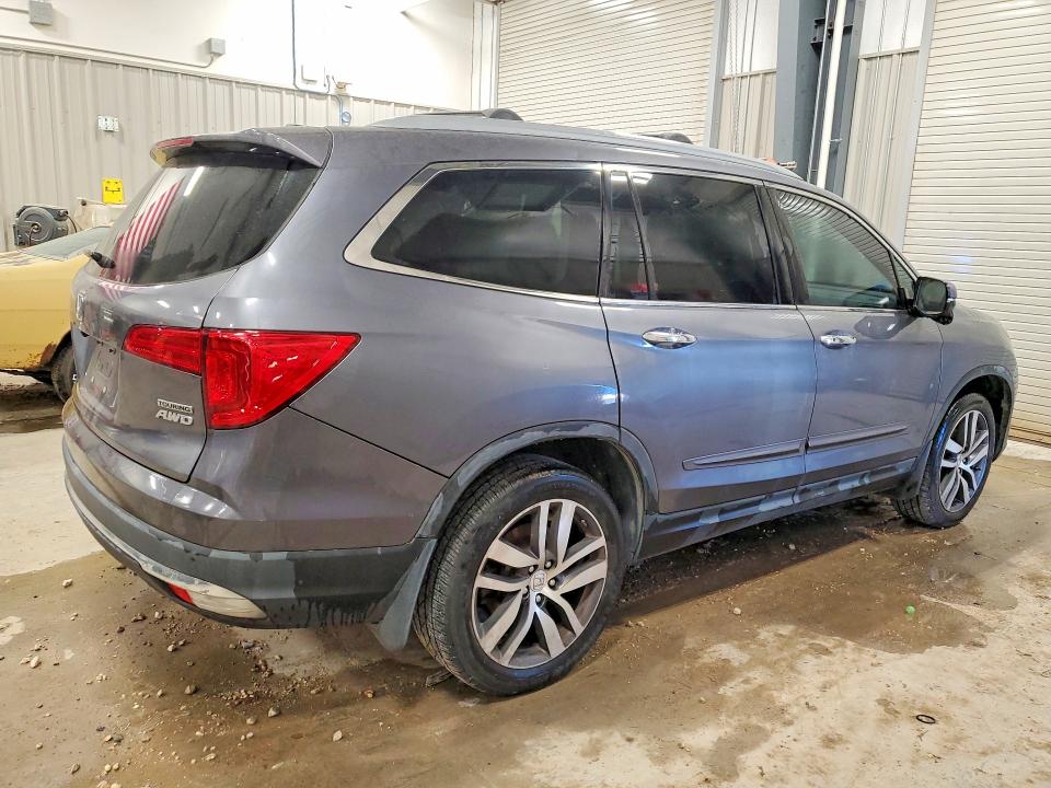 Photo 3 from auction – 2016 HONDA PILOT with VIN 5FNYF6H95GB103725