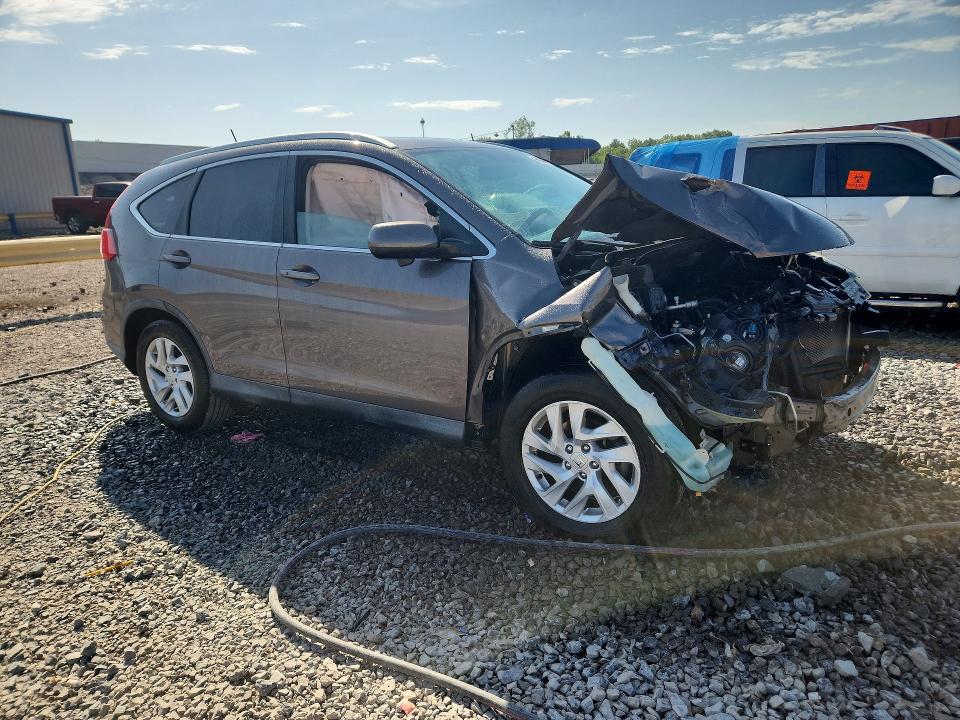 Photo 4 from auction – 2015 HONDA CR-V with VIN 2HKRM3H78FH522062