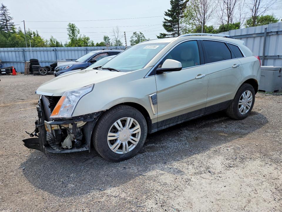 CADILLAC SRX 2014 with VIN 3GYFNEE35ES584692 - Photo from auction