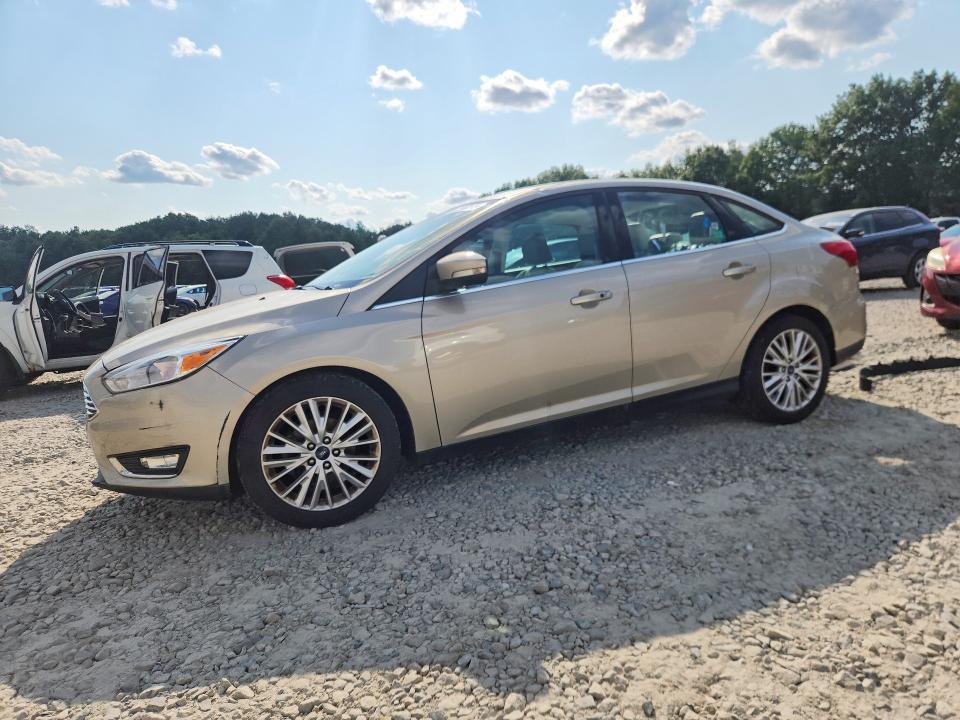FORD FOCUS 2017 with VIN 1FADP3J21HL321902 - Photo from auction