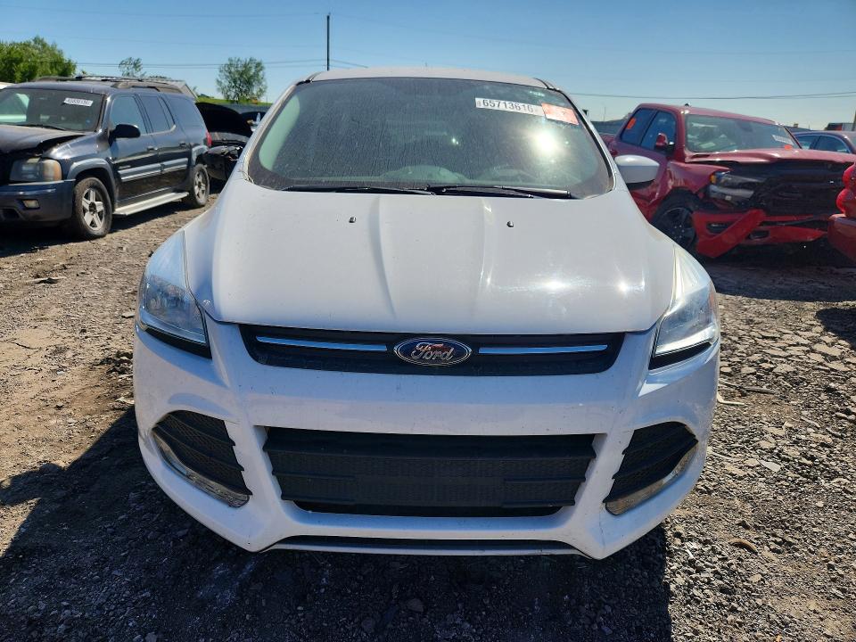 Photo 5 from auction – 2014 FORD ESCAPE with VIN 1FMCU9G92EUD36884