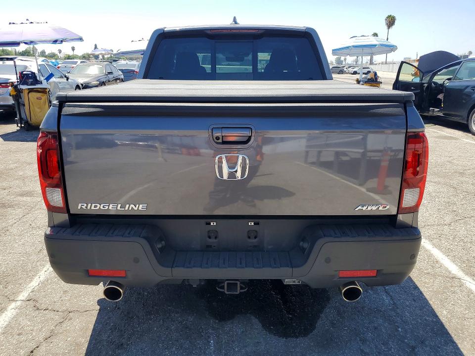 Photo 6 from auction – 2023 HONDA RIDGELINE with VIN 5FPYK3F75PB056232