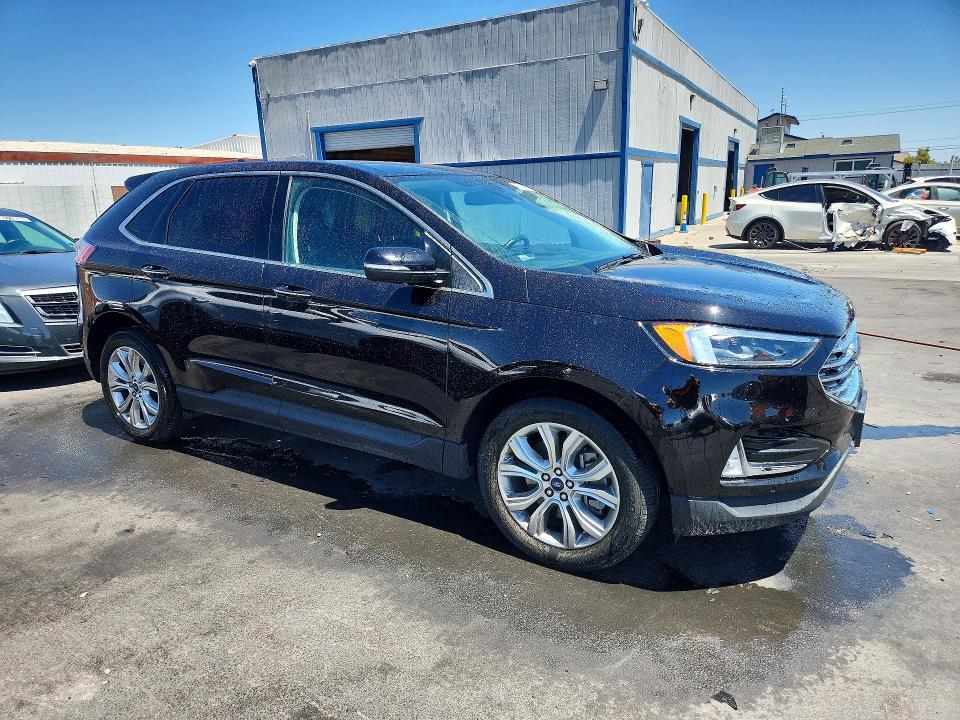 Photo 4 from auction – 2022 FORD EDGE with VIN 2FMPK4K98NBB04961
