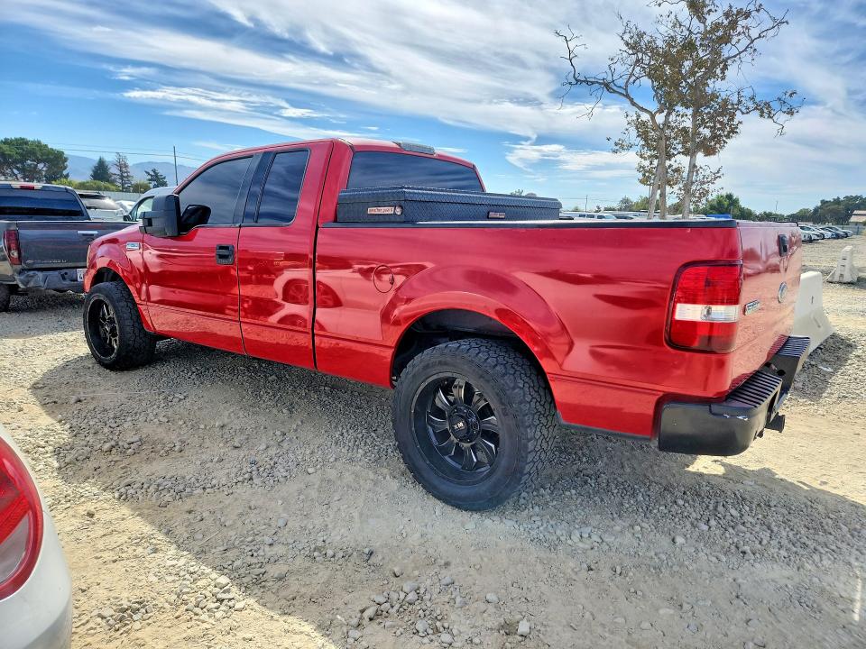 Photo 2 from auction – 2004 FORD F150 with VIN 1FTPX12564NA57658