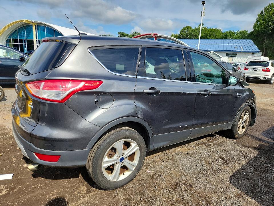 Photo 3 from auction – 2015 FORD ESCAPE with VIN 1FMCU9GX6FUA82208