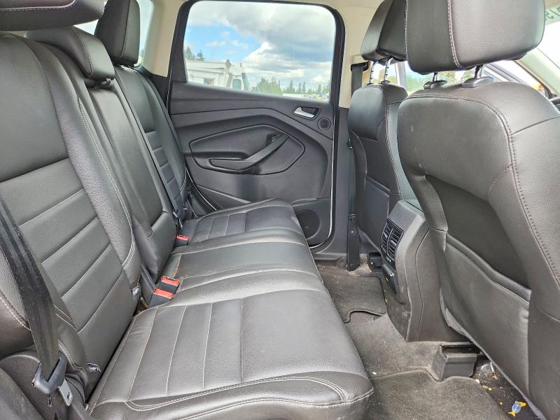 Photo 11 from auction – 2013 FORD ESCAPE with VIN 1FMCU9H94DUB56206