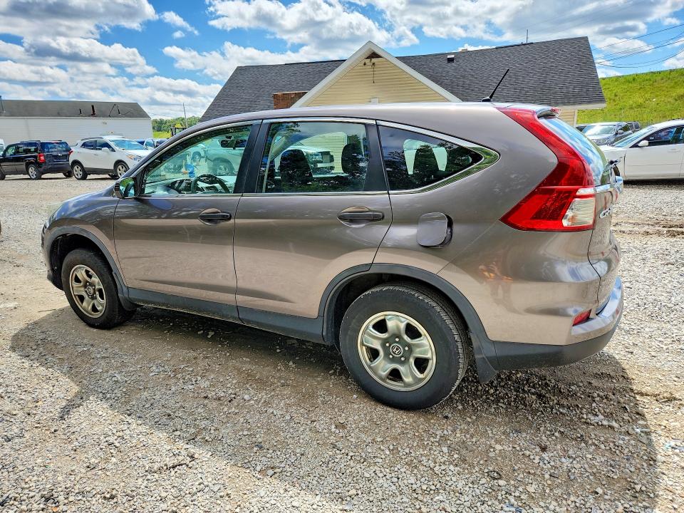 Photo 2 from auction – 2015 HONDA CR-V with VIN 5J6RM4H39FL051676