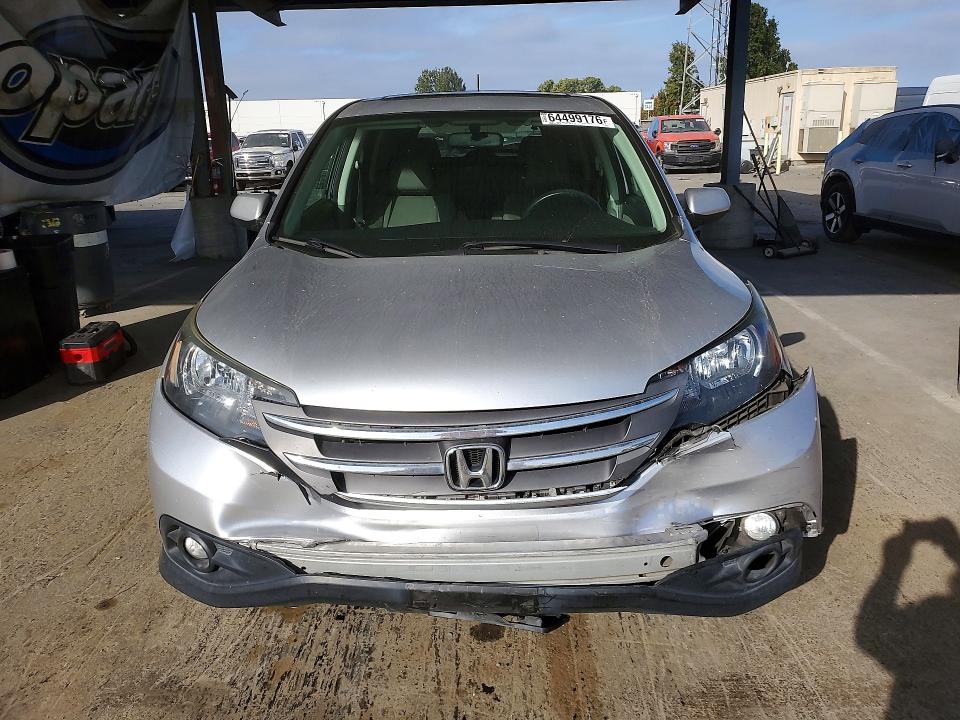 Photo 5 from auction – 2012 HONDA CR-V with VIN 2HKRM3H59CH502977