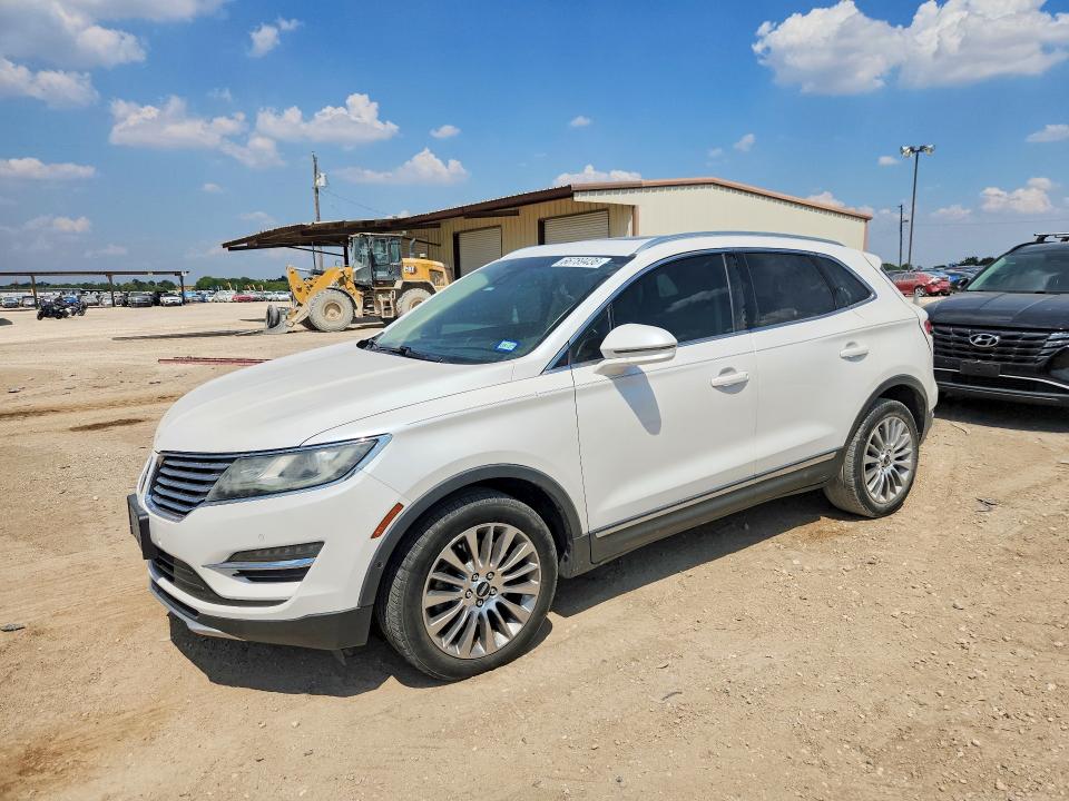 LINCOLN MKC 2015 with VIN 5LMCJ1A95FUJ30203 - Photo from auction