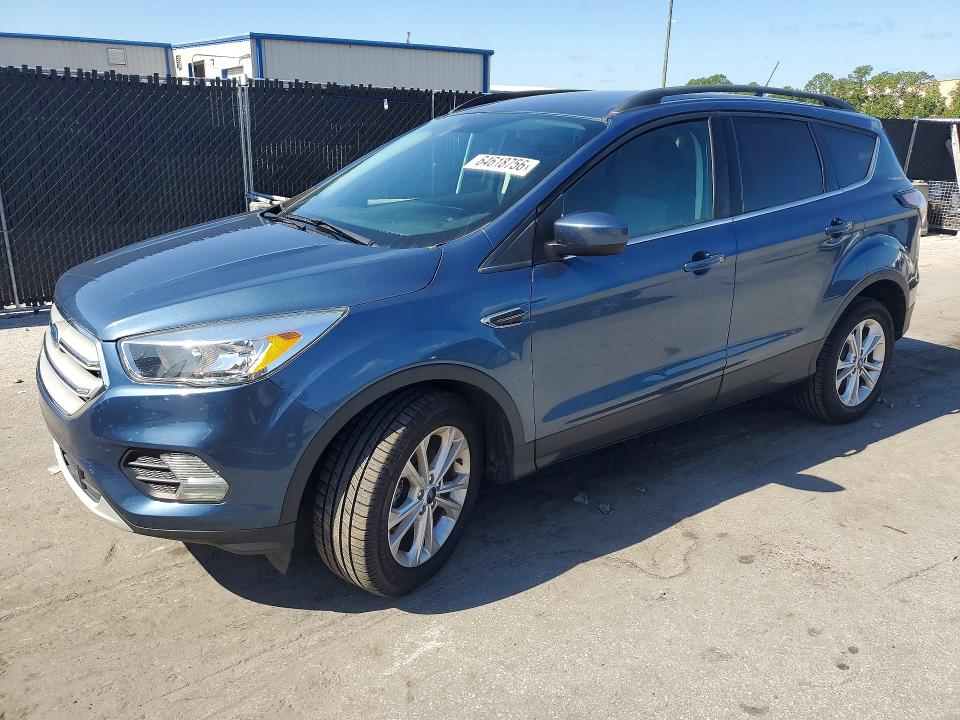 FORD ESCAPE 2018 with VIN 1FMCU0GD0JUC67171 - Photo from auction