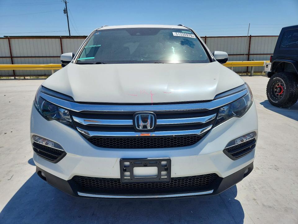 Photo 5 from auction – 2018 HONDA PILOT with VIN 5FNYF6H92JB037822