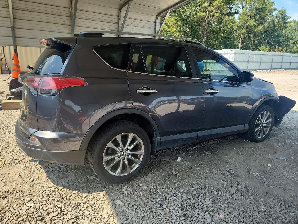 Photo 3 from auction – 2018 TOYOTA RAV4 with VIN JTMDFREV9JD257502
