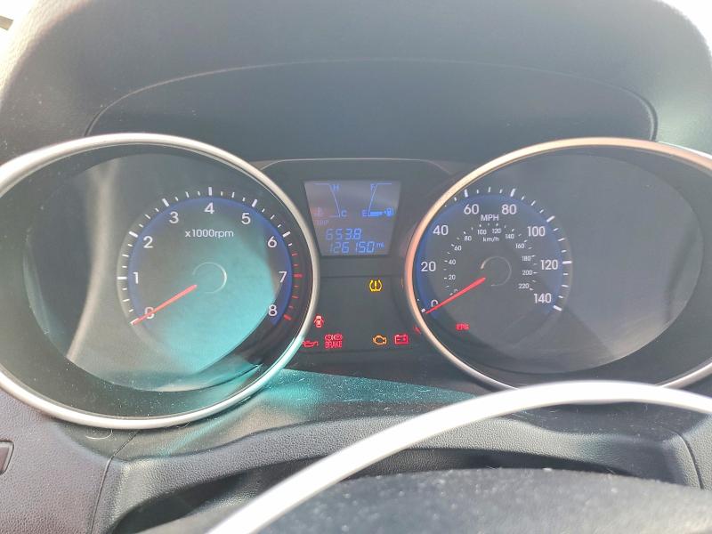 Photo 9 from auction – 2010 HYUNDAI TUCSON with VIN KM8JUCAC6AU093583