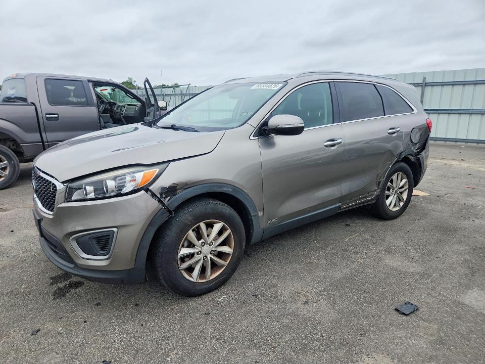 KIA SORENTO 2016 with VIN 5XYPGDA37GG046004 - Photo from auction