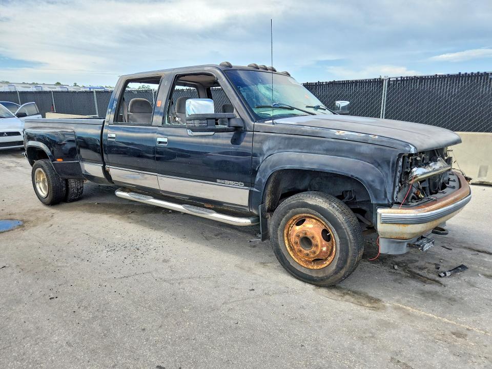 Foto 4 de la subasta – 2000 GMC SIERRA con VIN 1GTHK33J1YF453961