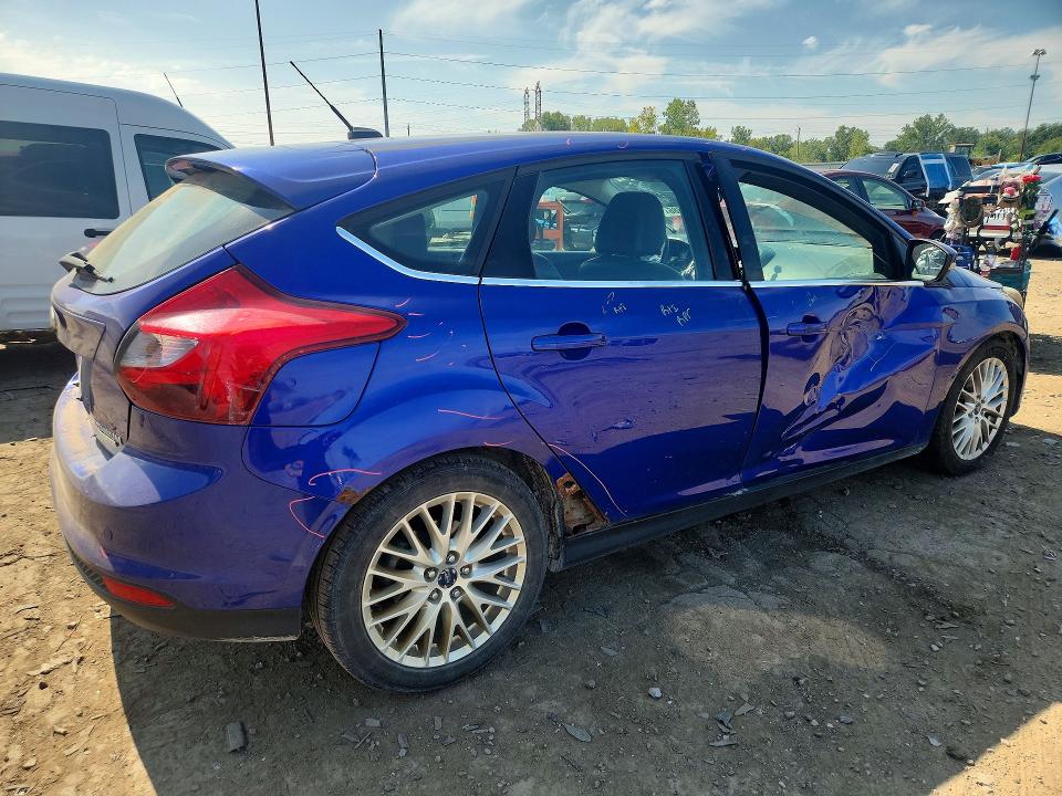 Foto 3 de la subasta – 2013 FORD FOCUS con VIN 1FADP3N2XDL327931