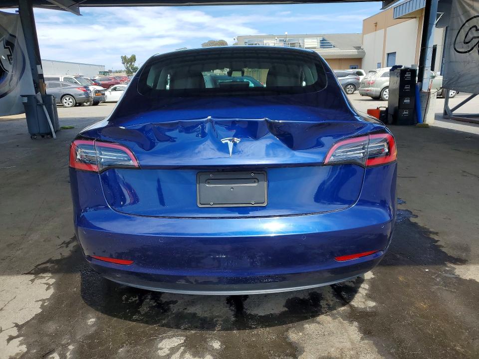 Photo 6 from auction – 2022 TESLA MODEL 3 with VIN 5YJ3E1EAXNF143469