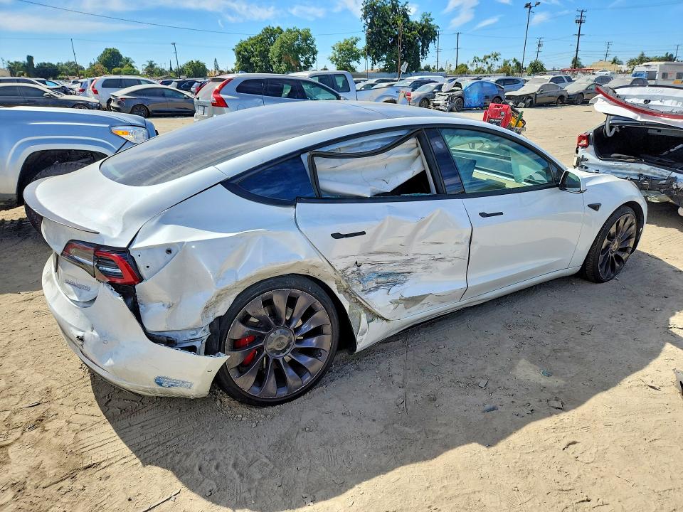 Photo 3 from auction – 2021 TESLA MODEL 3 with VIN 5YJ3E1EC1MF935929