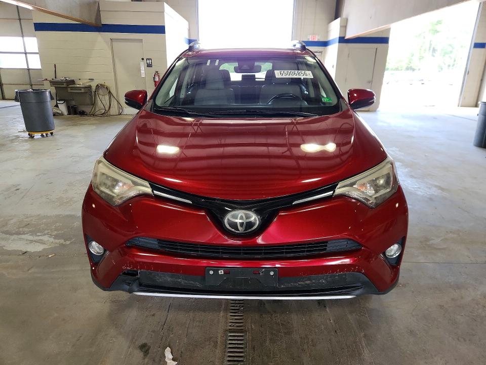Photo 5 from auction – 2018 TOYOTA RAV4 with VIN JTMDFREV8JD238522