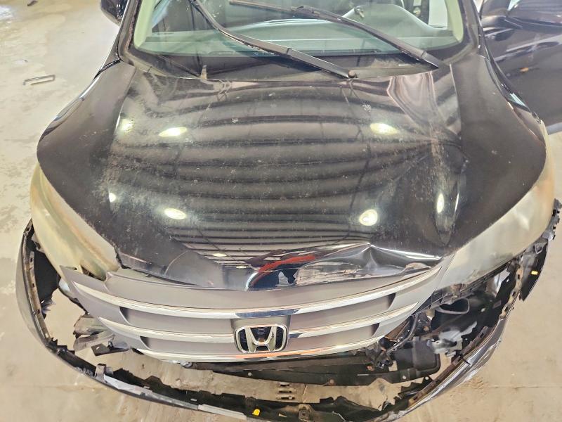 Photo 12 from auction – 2014 HONDA CR-V with VIN 5J6RM4H70EL106419