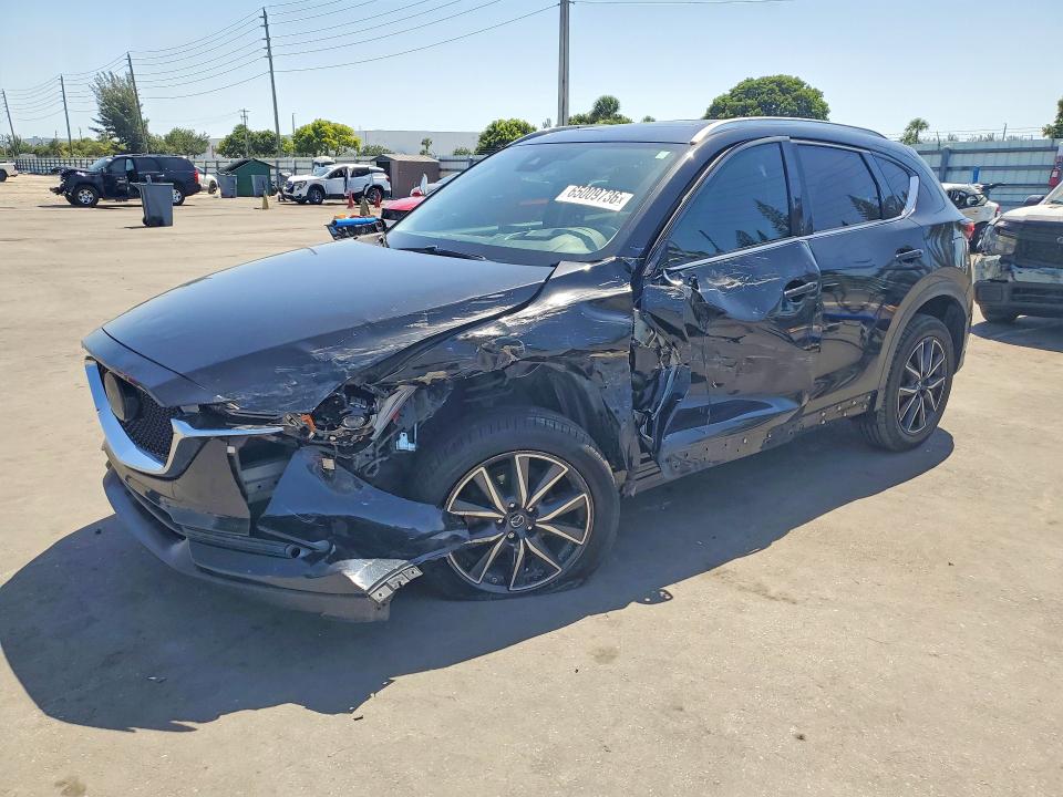 MAZDA CX-5 2018 with VIN JM3KFADM8J1349520 - Photo from auction
