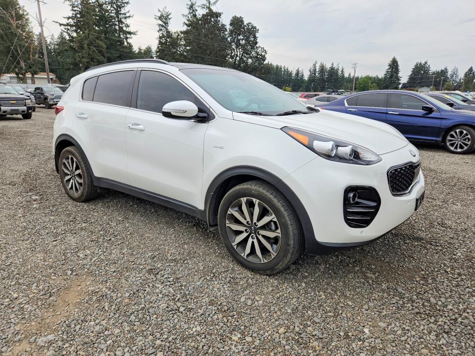 Photo 4 from auction – 2018 KIA SPORTAGE with VIN KNDPNCAC2J7328748