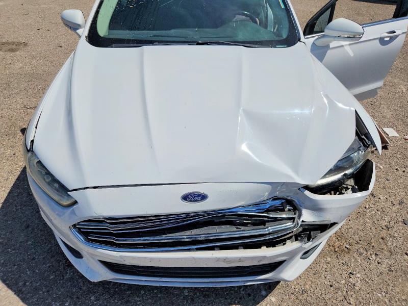 Photo 11 from auction – 2015 FORD FUSION with VIN 3FA6P0H72FR306168