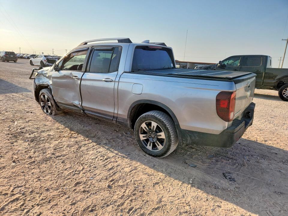 Photo 2 from auction – 2017 HONDA RIDGELINE with VIN 5FPYK3F51HB011336