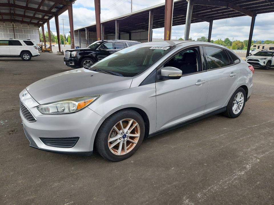 FORD FOCUS 2015 with VIN 1FADP3F23FL277018 - Photo from auction