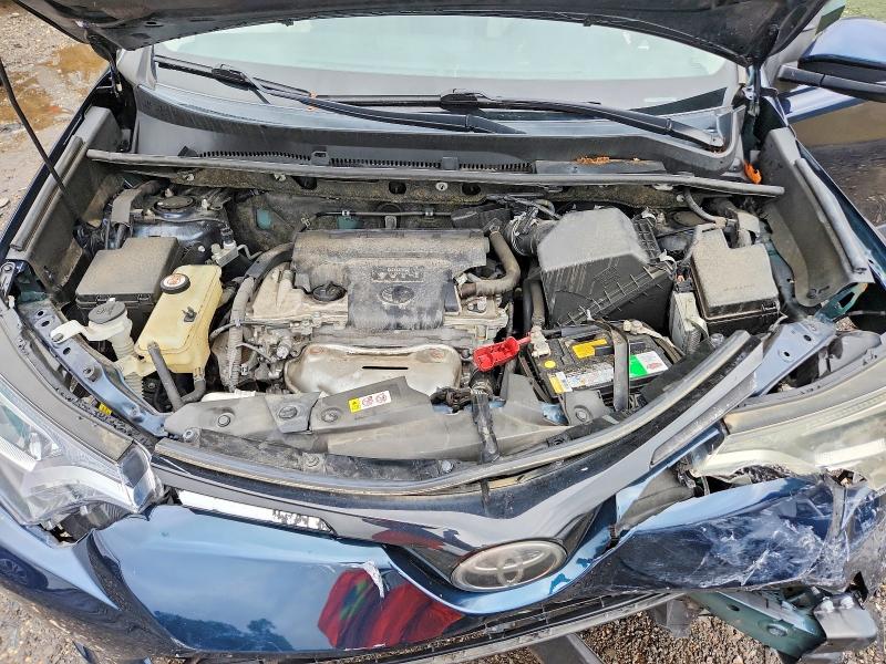 Photo 12 from auction – 2018 TOYOTA RAV4 with VIN JTMRFREV6JJ233942