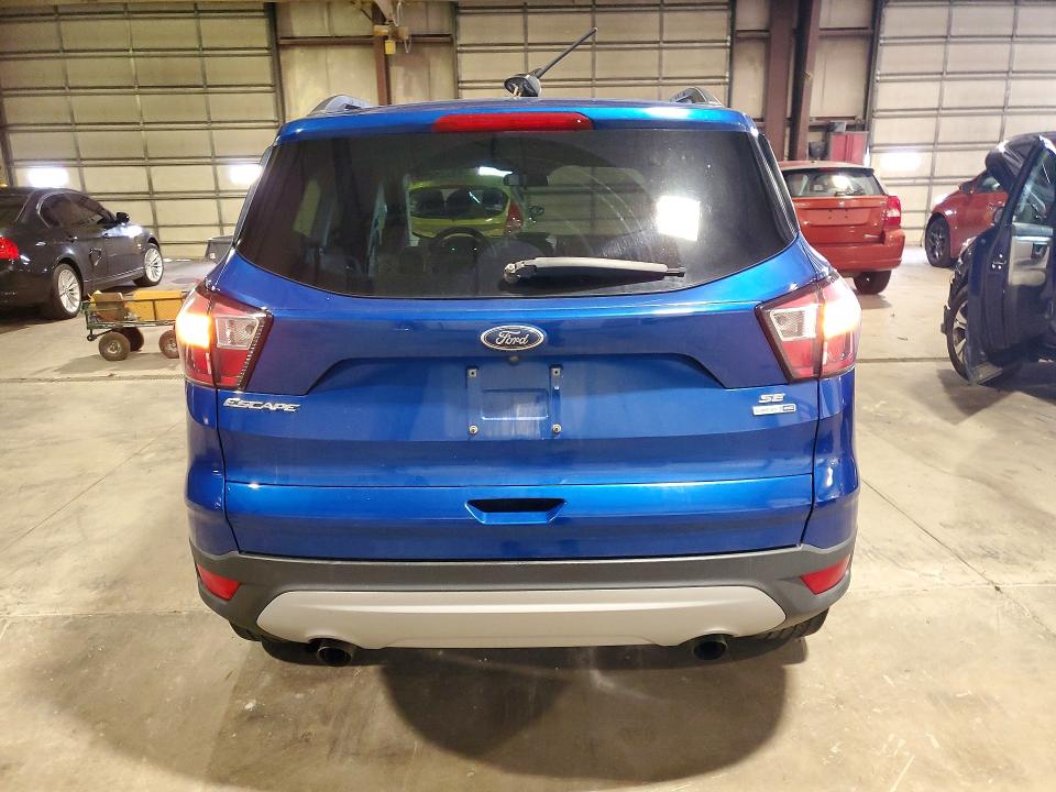 Photo 6 from auction – 2018 FORD ESCAPE with VIN 1FMCU9GD1JUA28409