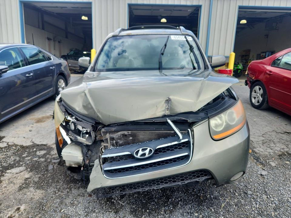 Photo 5 from auction – 2009 HYUNDAI SANTA FE with VIN 5NMSH73E99H286753