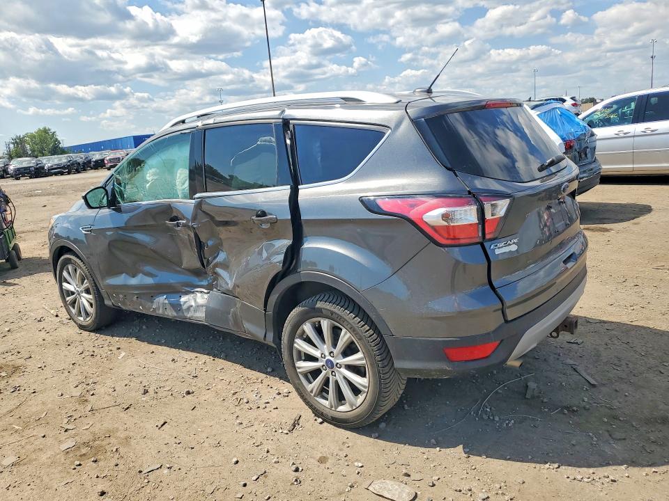 Photo 2 from auction – 2017 FORD ESCAPE with VIN 1FMCU9J98HUB78502