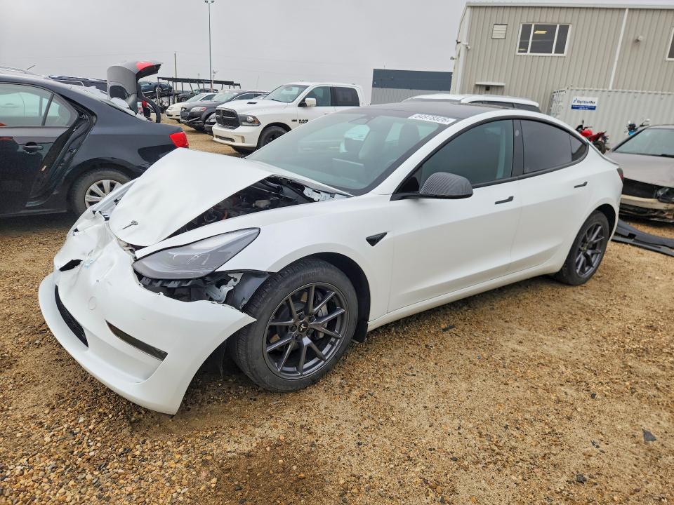 TESLA MODEL 3 2023 with VIN LRW3E1FA0PC871958 - Photo from auction