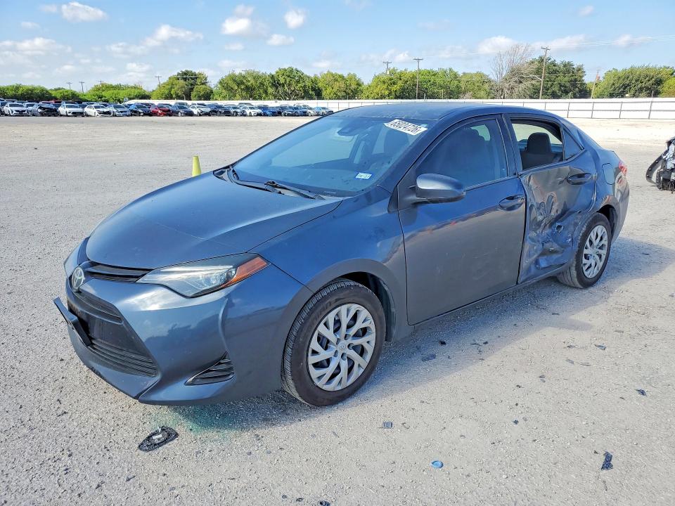 TOYOTA COROLLA 2018 with VIN 5YFBURHE8JP810985 - Photo from auction