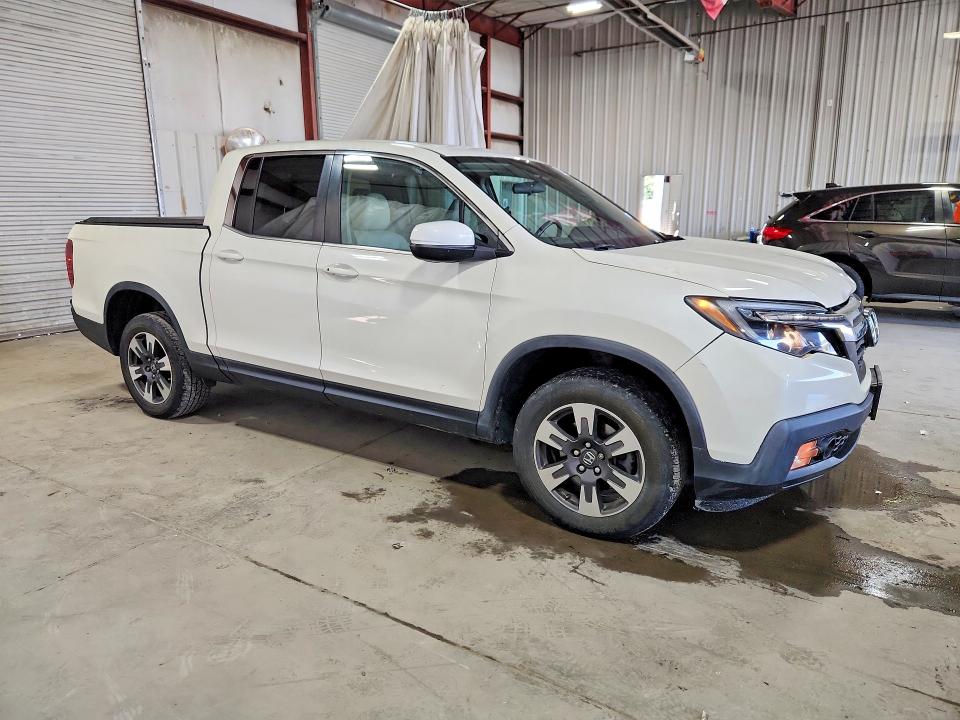 Photo 4 from auction – 2019 HONDA RIDGELINE with VIN 5FPYK3F5XKB030815