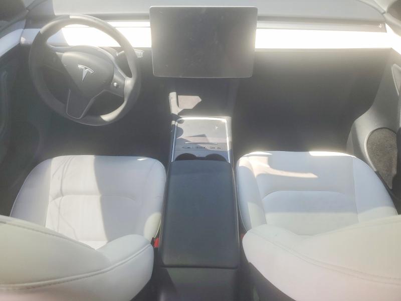 Photo 8 from auction – 2023 TESLA MODEL Y with VIN 7SAYGAEE9PF806104
