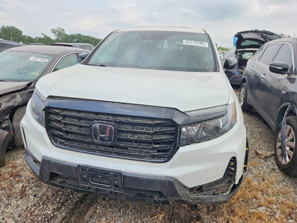Photo 5 from auction – 2023 HONDA RIDGELINE with VIN 5FPYK3F80PB020599