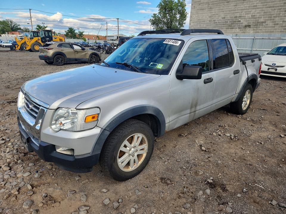 FORD EXPLORER SPORT TRAC 2010 with VIN 1FMEU5BE9AUA41393 - Photo from auction