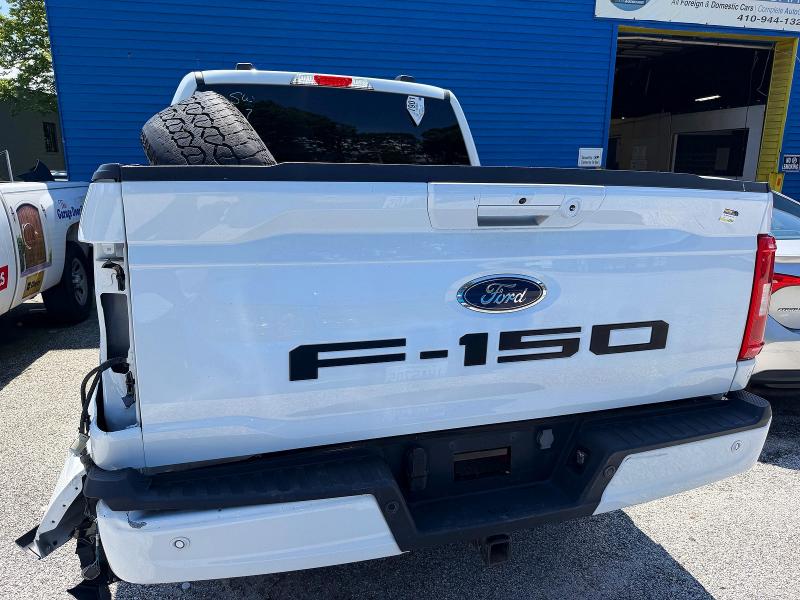 Photo 12 from auction – 2023 FORD F150 with VIN 1FTFW1E53PFB74610