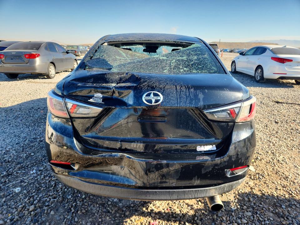 Снимка 6 от търг – 2016 SCION IA с VIN 3MYDLBZV0GY102841