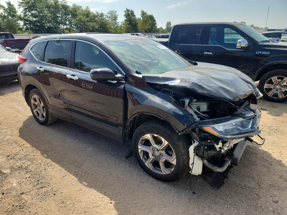 Photo 4 from auction – 2018 HONDA CR-V with VIN 7FARW2H58JE020019